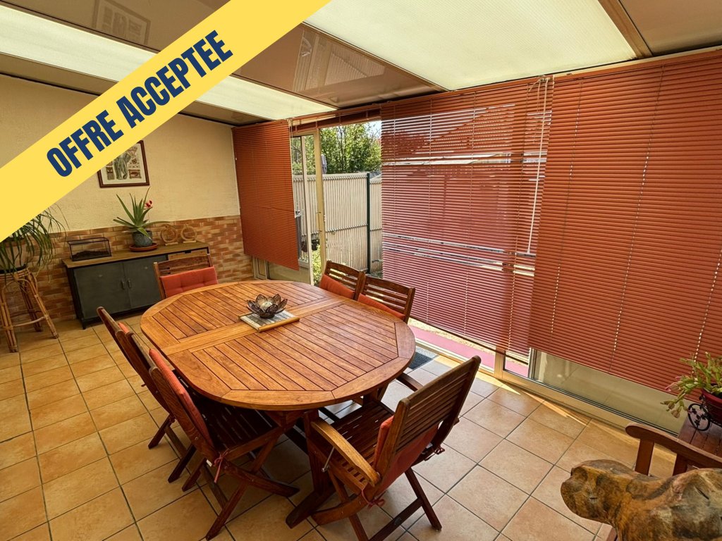 Maison familiale avec 4 chambres, jardin et garage
